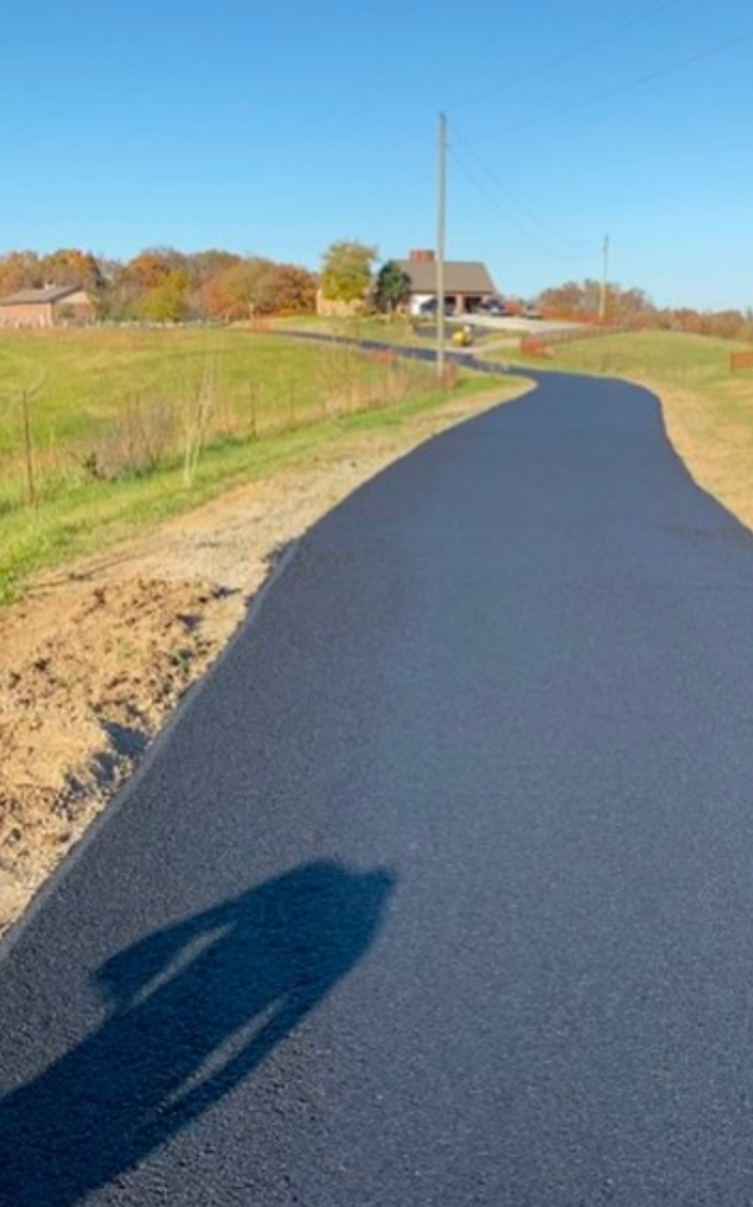 Curving driveway freshly paved